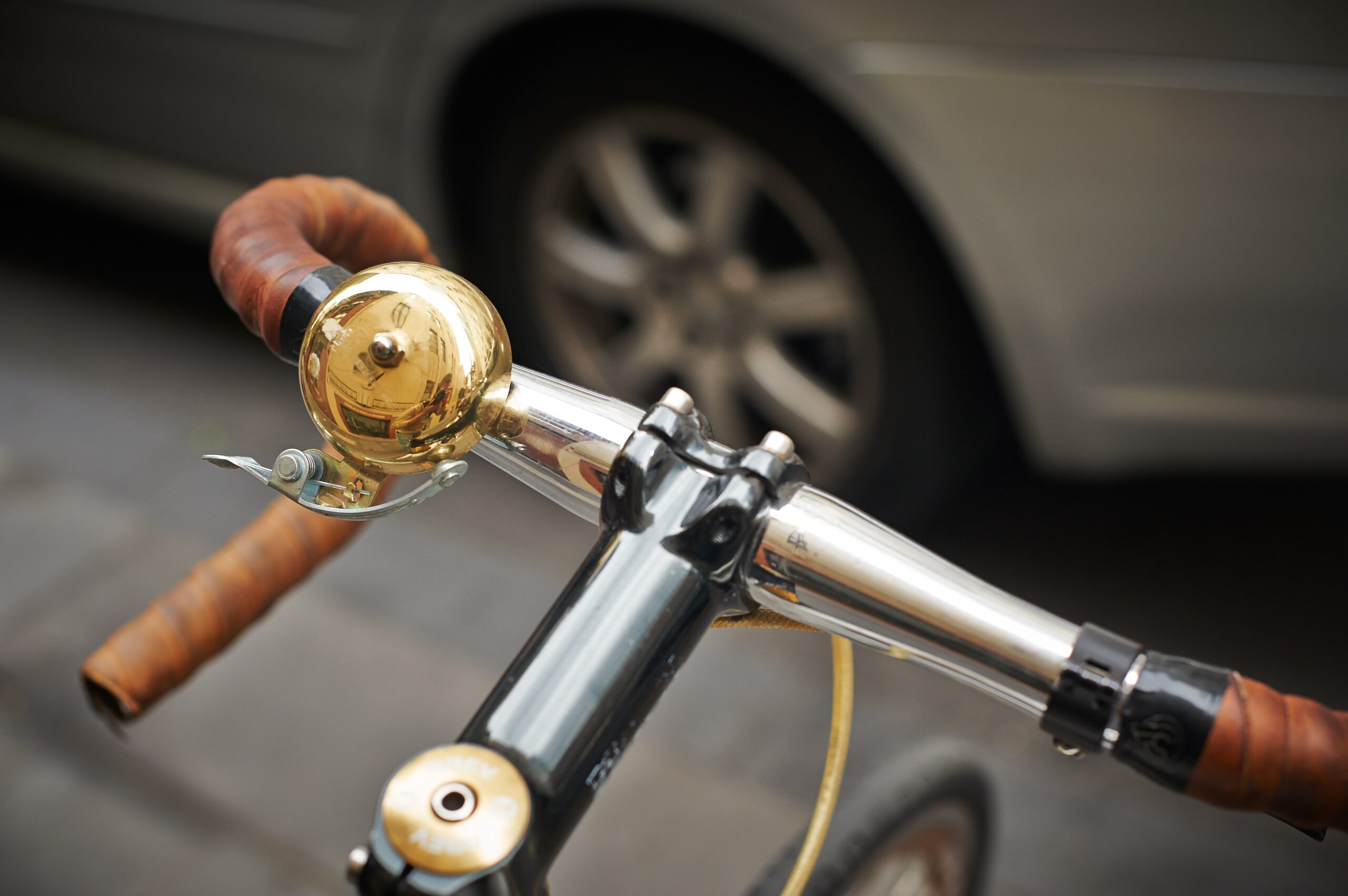 bicycle handle with a bell on it